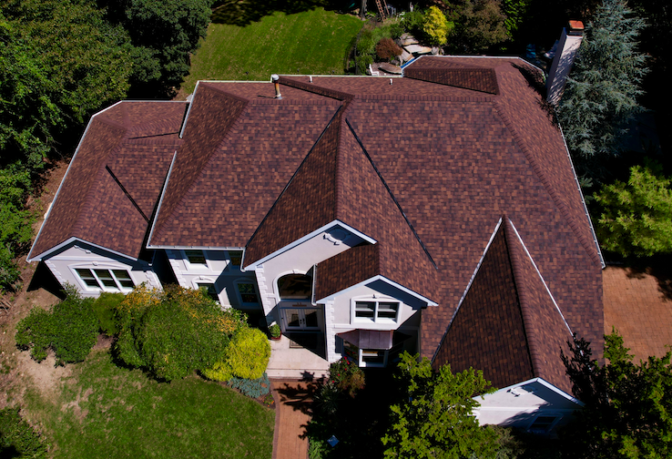 Gikas Roofing specialists performing a roof repair in Tappan, NY