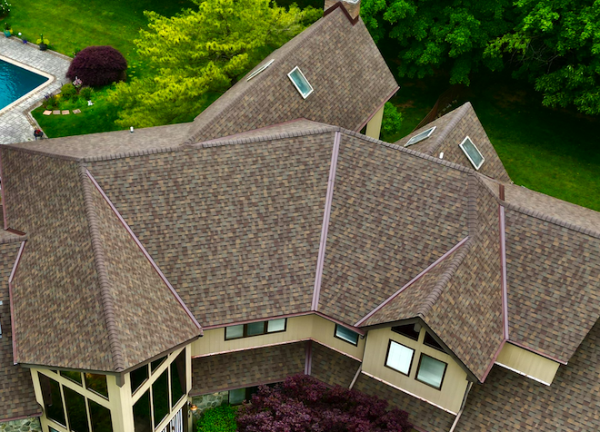 Skilled Gikas Roofing professionals installing a roof in Nanuet
