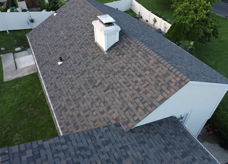 Gikas Roofing specialists performing roof inspection in Cortlandt